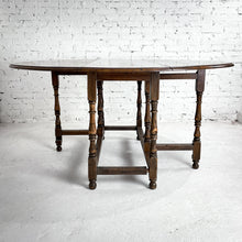 Load image into Gallery viewer, Round Early American Drop Leaf Dining Table
