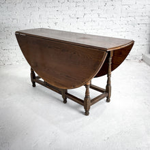 Load image into Gallery viewer, Round Early American Drop Leaf Dining Table
