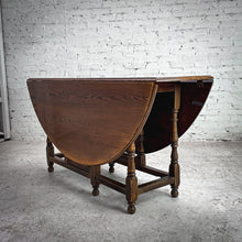 Load image into Gallery viewer, Round Early American Drop Leaf Dining Table
