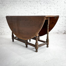Load image into Gallery viewer, Round Early American Drop Leaf Dining Table
